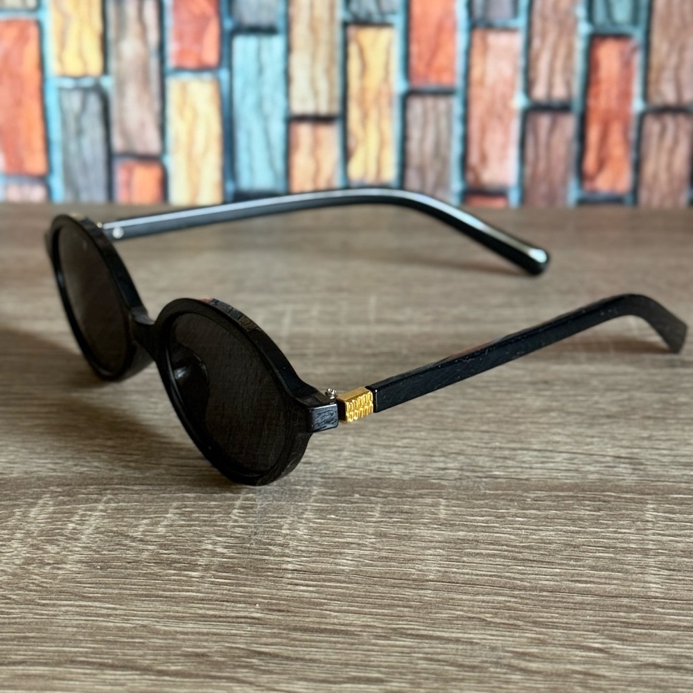 Stylish Black Sunglasses with Gold Accent